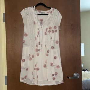 Barely worn white with pink dandelion dress with a white under layer dress